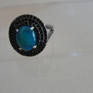 1.60 Oval Cab. Blue Ethopian Oval Blk Spinel Ring